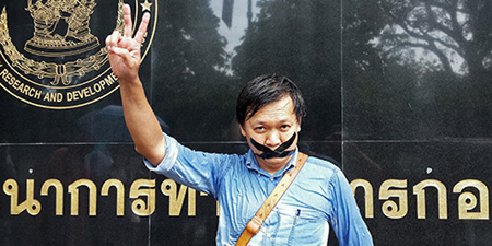 Thai columnist Pravit Rojanaphruk charged with two cases of sedition