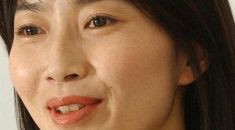 Body of slain Japanese journalist returns home