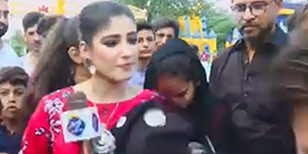 Female reporter slaps young boy while covering Eid festivities