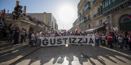Malta newspapers, citizens take up slain reporter's message