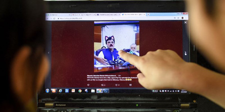 Minister's presser live streamed with cat whiskers, ears