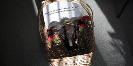 Russian newspaper is sent funeral wreath and goat's head in latest threats